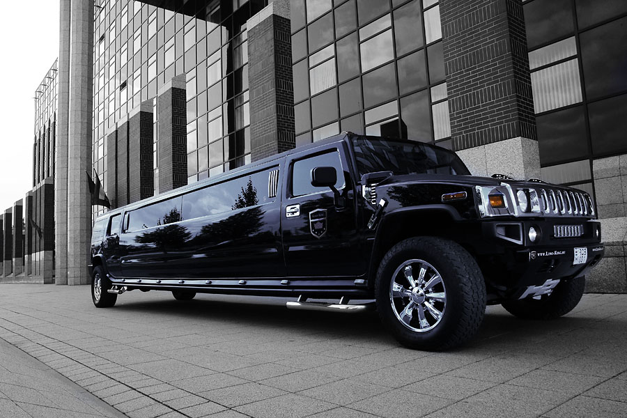 Black Hummer limousine parked in Budapest – luxury limo rental for parties, weddings and VIP events.