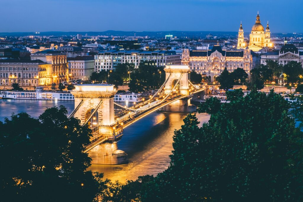 Budapest Chain Bridge and St. Stephen’s Basilica at night, one of the city’s stunning hidden photo spots for limo tours.