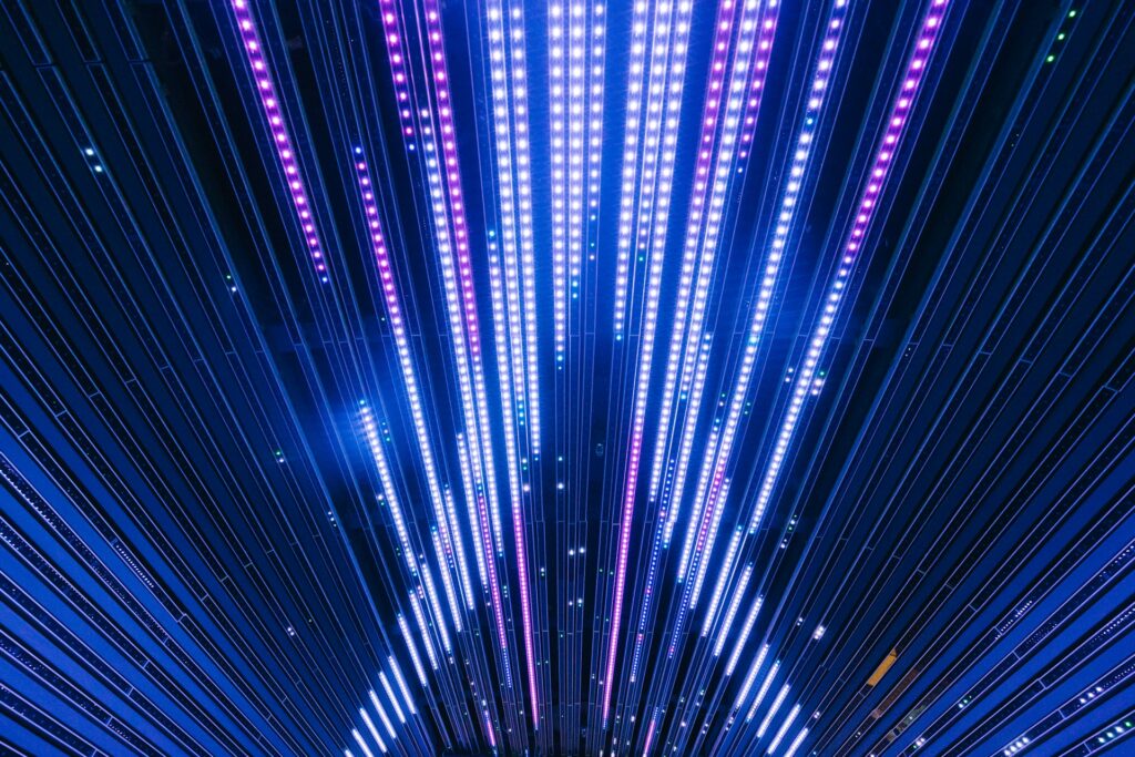 Colorful LED ceiling lights creating a vibrant party atmosphere in Budapest luxury transportation.